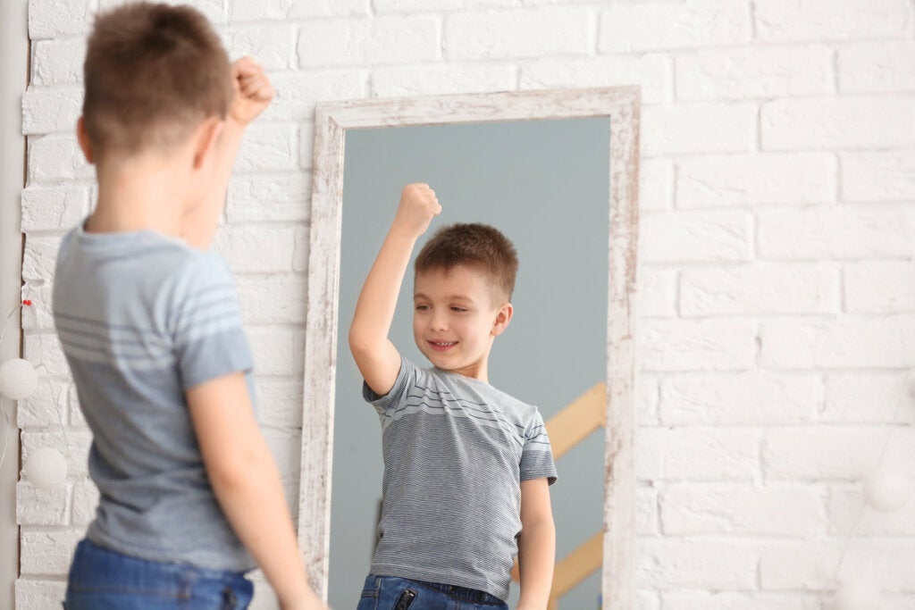 Child looking in the mirror with narcissistic tendencies